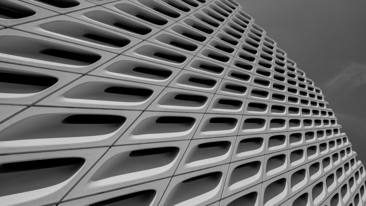 A striking black and white image of The Broad's unique architectural facade in Los Angeles.